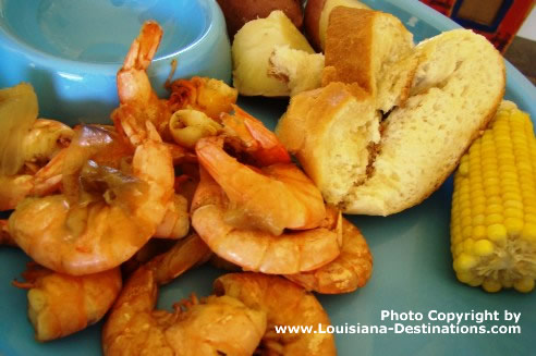 Fresh, boiled Louisiana Shrimp along with French Bread, corn on the cob and boiled potatoes